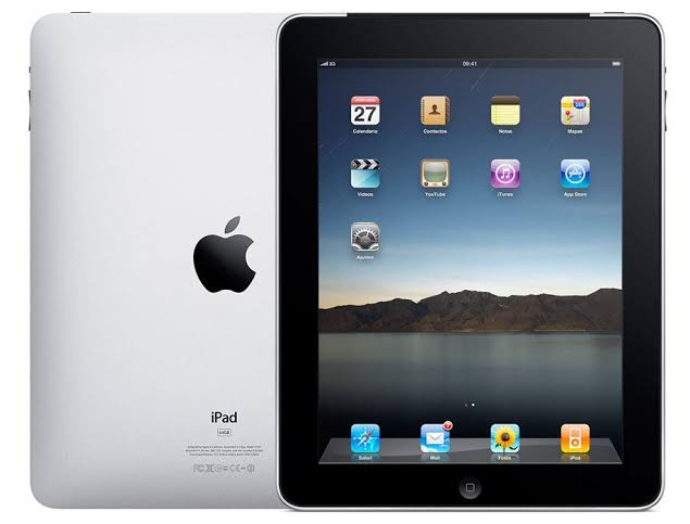 The original Apple iPad, shown front and back, displaying its home screen.
